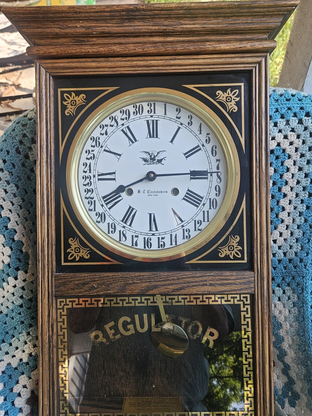 Regulator Wall Clock in Black and Gold by H. C. Clockmakers